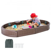 Brown oval HDPE sandbox with cover and four corner seats for outdoor play.