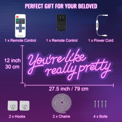 Pink LED neon sign reading "You're Like Really Pretty" measures 27.5 by 12 inches with remote, power cord, hooks, chains, and bolts.