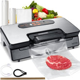 Silver Bostome vacuum sealer machine with digital controls, vacuum bags, and fresh vegetables and steak.