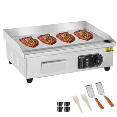 Silver Bostome 3200W electric griddle with flat top cooking four steaks, control panel, and included spatulas.