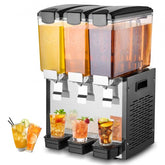 Black commercial beverage dispenser with three 10L clear tanks holding orange, pink, and brown cold juices, plus sample glasses below.