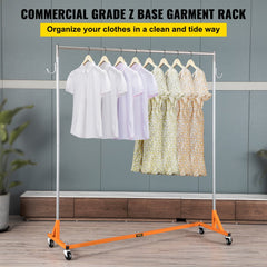 Height adjustable orange steel garment rack with double hooks and four swivel casters.