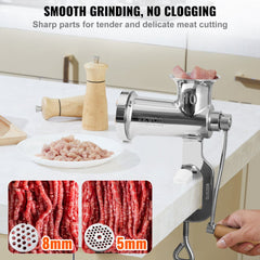 Stainless steel manual meat grinder with tabletop clamp and sausage stuffing tube.