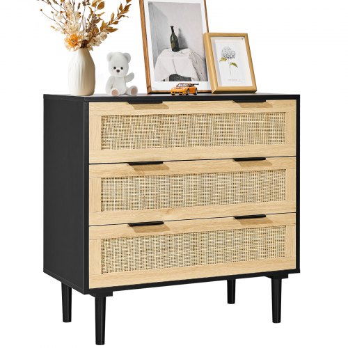 Black boho dresser with three rattan drawers and sturdy legs for versatile storage.