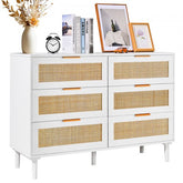 White boho dresser with six rattan drawers and a sturdy top for versatile storage solutions.