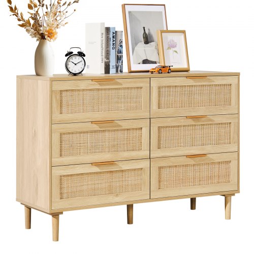Bostome 6-drawer rattan dresser in boho natural wood brown with woven fronts and tapered legs.