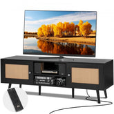 Black boho rattan TV stand with spacious cabinets and a sturdy tabletop for a 65-inch TV.