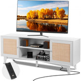 White rattan TV stand for 75-inch TV with storage cabinets, power strip, and media shelves.