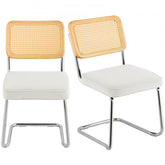 Pair of mid-century modern dining chairs with rattan backs, white velvet seats, and chrome cantilever frames.