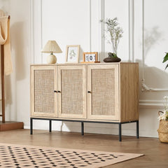 Natural rattan storage cabinet with three magnetic doors on a wooden frame.