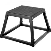 Black steel 12-inch plyometric jump box with non-skid rubber surface and trapezoidal frame.