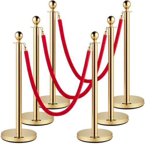 Six gold stainless steel stanchions with 5 ft red velvet ropes, arranged in a line.