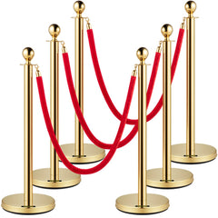 Six gold stainless steel stanchions with 5 ft red velvet ropes and weighted bases.