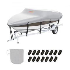 Grey waterproof boat cover on a 20-22 ft V-hull boat on trailer, with straps and storage bag.