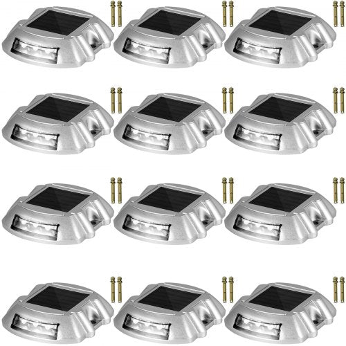 12-pack of silver solar driveway lights with white LED panels and mounting screws.