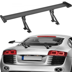 Black adjustable aluminum GT wing spoiler mounted on the rear of a silver sports car.