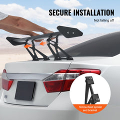 Black adjustable aluminum GT wing spoiler mounted on a white car's trunk with secure brackets.