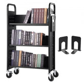 Black rolling book cart with V-shaped shelves, books, bookends, and wheels.