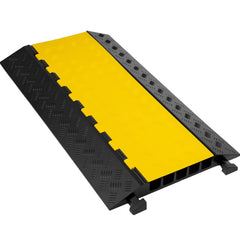 Black and yellow rubber cable protector ramp with five channels for safe cable management.