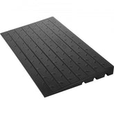 Black Bostome 3-inch rubber threshold ramp with grooved surface and three channels.