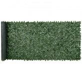 Artificial ivy privacy fence with green leaves on a plastic frame, measuring 59"x158".