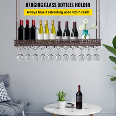 Adjustable coppery ceiling wine rack holding bottles and inverted glasses.