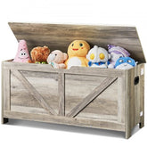 Open gray wooden toy chest filled with colorful stuffed animals, measuring 39x16x19 inches.
