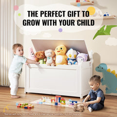 White wooden toy chest with a safety hinge lid and ample storage for toys and clothes.