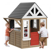 Cedar wooden playhouse with sink, door, windows, and flowerpot racks for kids' outdoor play.