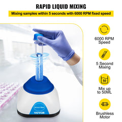 Hand operating Bostome Mini Vortex Mixer with blue silicone cap and white base on lab table.