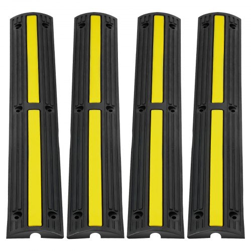 Four black rubber cable protector ramps with yellow stripes, each 39 inches long, in a pack.