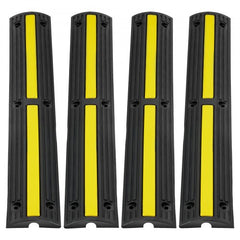 Four black rubber cable protector ramps with yellow stripes, each 39 inches long, in a pack.