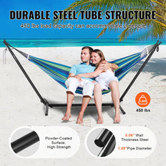Steel hammock stand with a couple lounging in a colorful hammock, supporting up to 450 lbs.