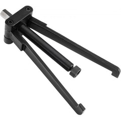 Steel bearing carrier puller with adjustable arms for marine engine maintenance.