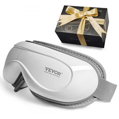 White Bostome heated eye massager with gray strap, shown with black gift box and gold ribbon.