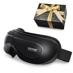 Black Bostome heated eye massager with 5 modes and Bluetooth, shown folded in gold gift box.