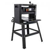 Black 13-inch thickness planer with stand, dust exhaust port, and foldable tables.