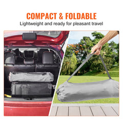 Compact foldable baby playpen with canopy, shown packed in a red car trunk and carried in a bag outdoors.