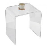 Clear acrylic C-shaped side table, 18mm thick, with a white cup on top.