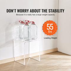 Clear acrylic C-shaped side table with 18mm thickness, supporting 55 lbs as shown with water bottles.