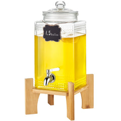 Bostome 1.5-gallon glass beverage dispenser with a stainless steel spigot and wooden stand.
