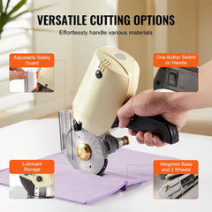Electric rotary fabric cutter with 1.1-inch octagonal blade, adjustable safety guard, and one-button switch.