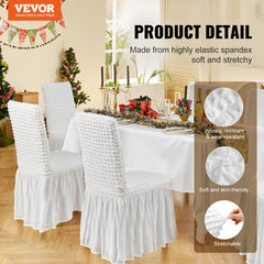 White stretch spandex folding chair covers with skirts, shown on four chairs in a festive room.