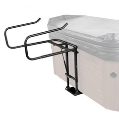 Black hydraulic hot tub cover lift with adjustable arms mounted on a beige spa.