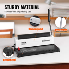 White Bostome manual coil binding machine with 34-hole puncher, metal arm, and ABS plastic shell on a desk.