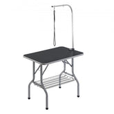 Bostome foldable pet grooming table with stainless steel, adjustable arms, and non-slip rubber pads.