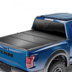 Black Bostome Tri-Fold Tonneau Cover for 2009-2024 Ram 1500 with LED light and easy installation.