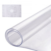 Clear 14x24 inch PVC table protector, 1.5mm thick, shown flat and rolled.