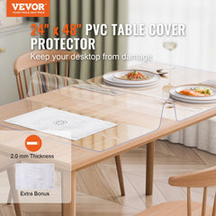 Clear 24x48 inch PVC table protector, 2.0mm thick, on a wooden dining table with plates.