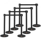 Eight black plastic crowd control stanchions with 6.5-foot retractable black belts and weighted bases.